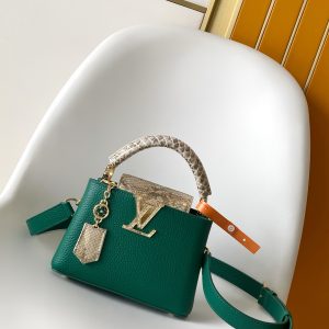 p120021 x 13.6 x 8 (cm) (Length x Height x Width) 27 x 17.3 x 9 (cm) (Length x Height x Width) • Taurillon calf leather • Taurillon calf leather trim • Calf leather lining • Metal hardware • Flap can be positioned inside or outside • Compartments include zippered pocket and slip pocket • Metal studs • Holds smartphone, LV Vertical wallet, headphones,keys, and lipstick • Shoulder strap: detachable, adjustable • Strap length: 46.5 cm • Adjustable strap length: 55.0 cm • Handle: single handle